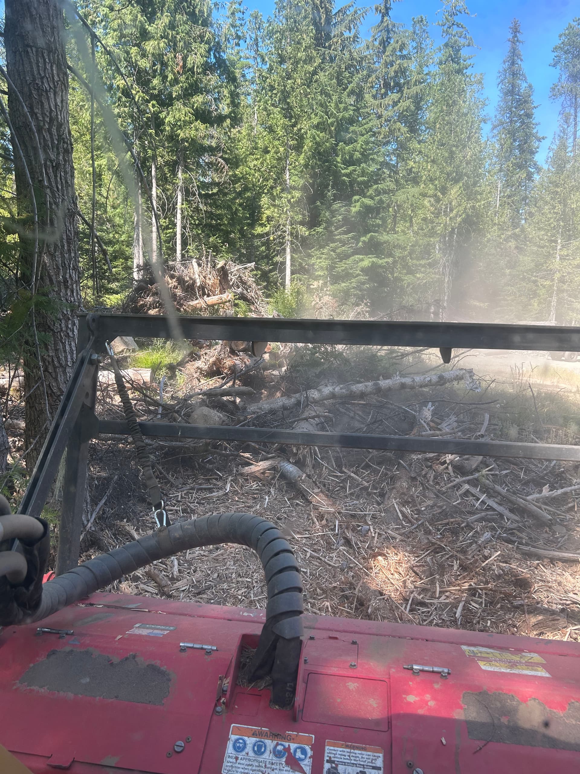 Brush Piles Gone - Forestry Mulching Cleans Up Fast image